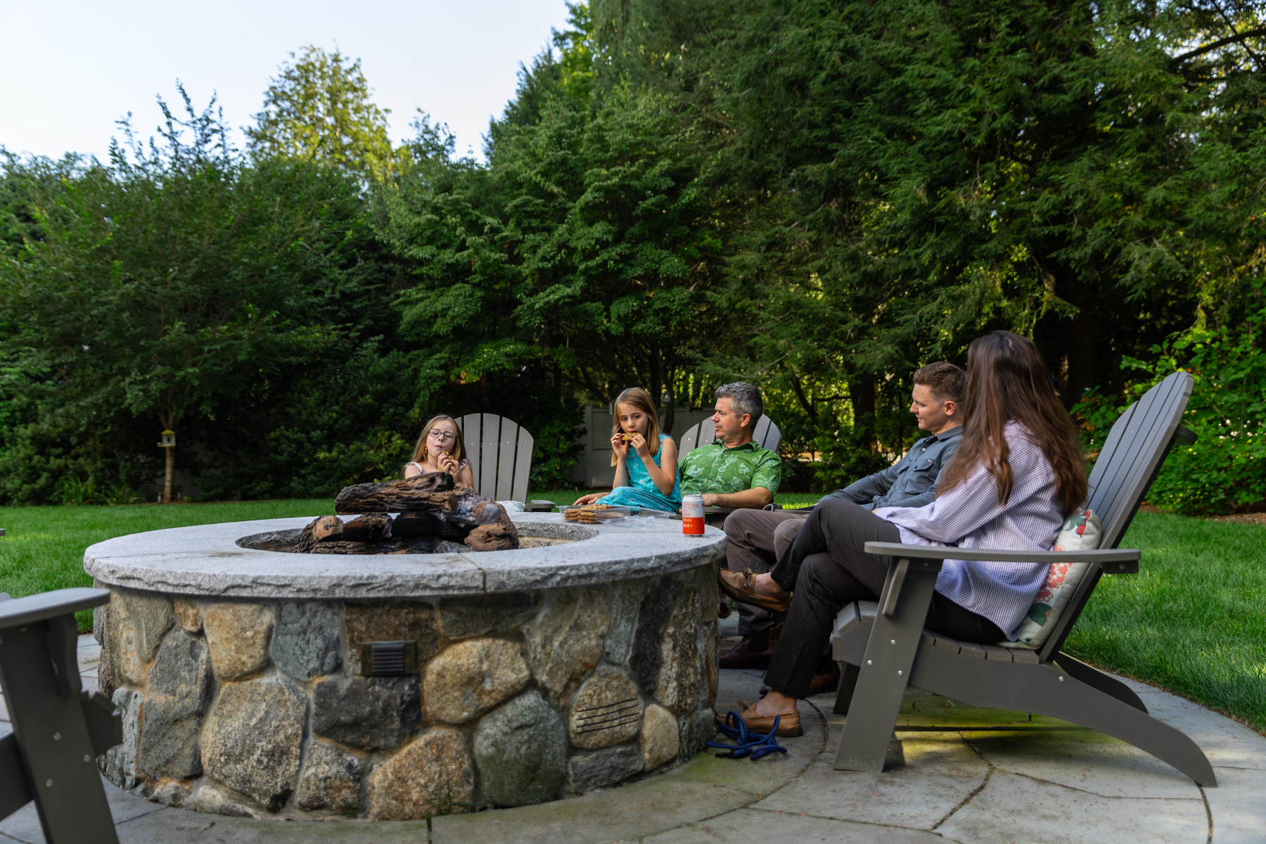 barrett-tree-service-family-relaxing-patio-near-trees-shrubs-day2-255