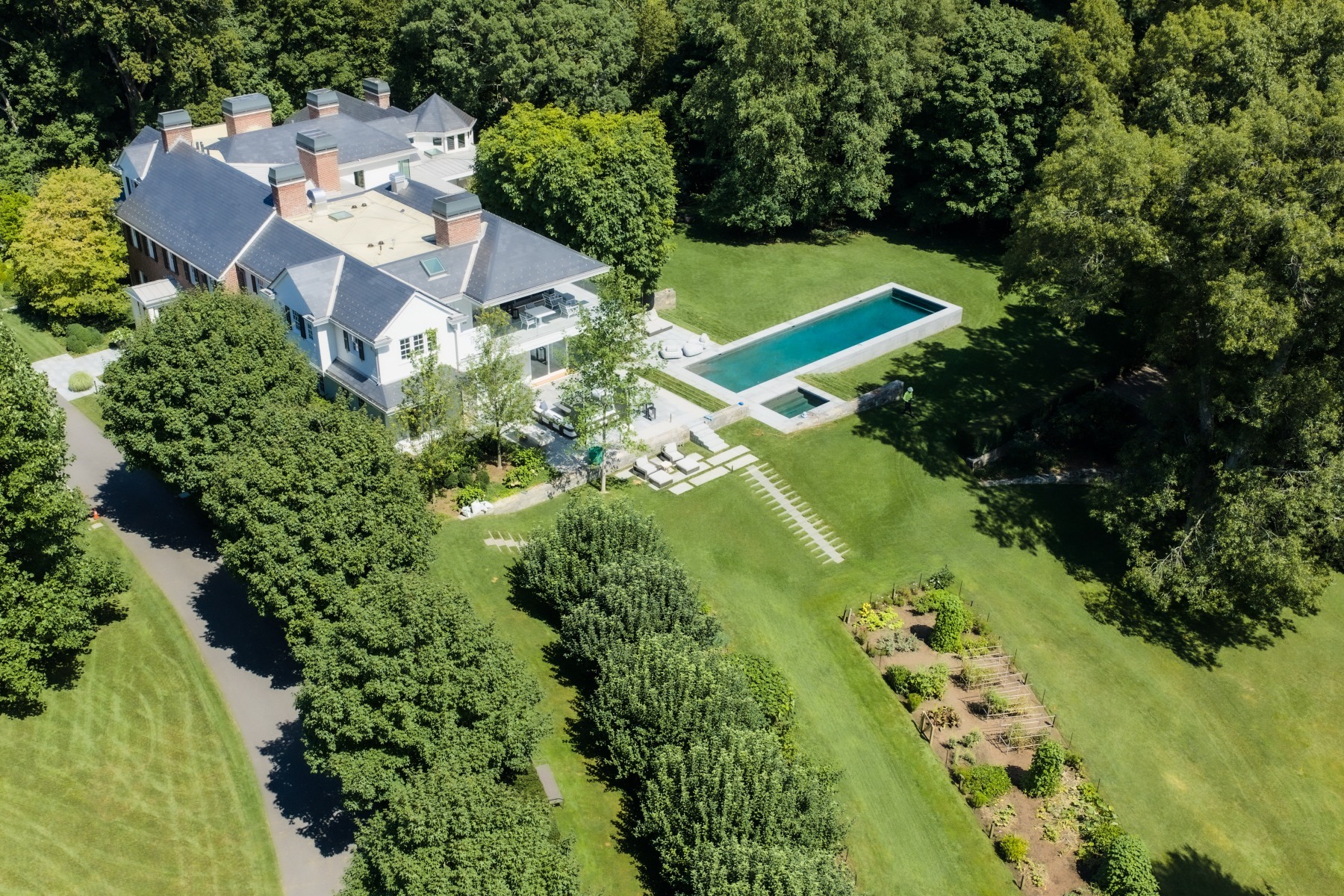 aerial view of well landscaped estate property